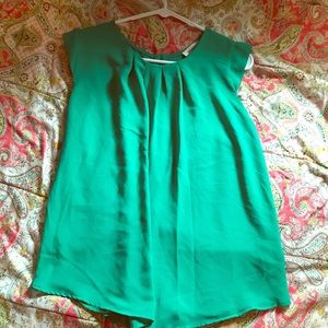 Beautiful button-up back blouse